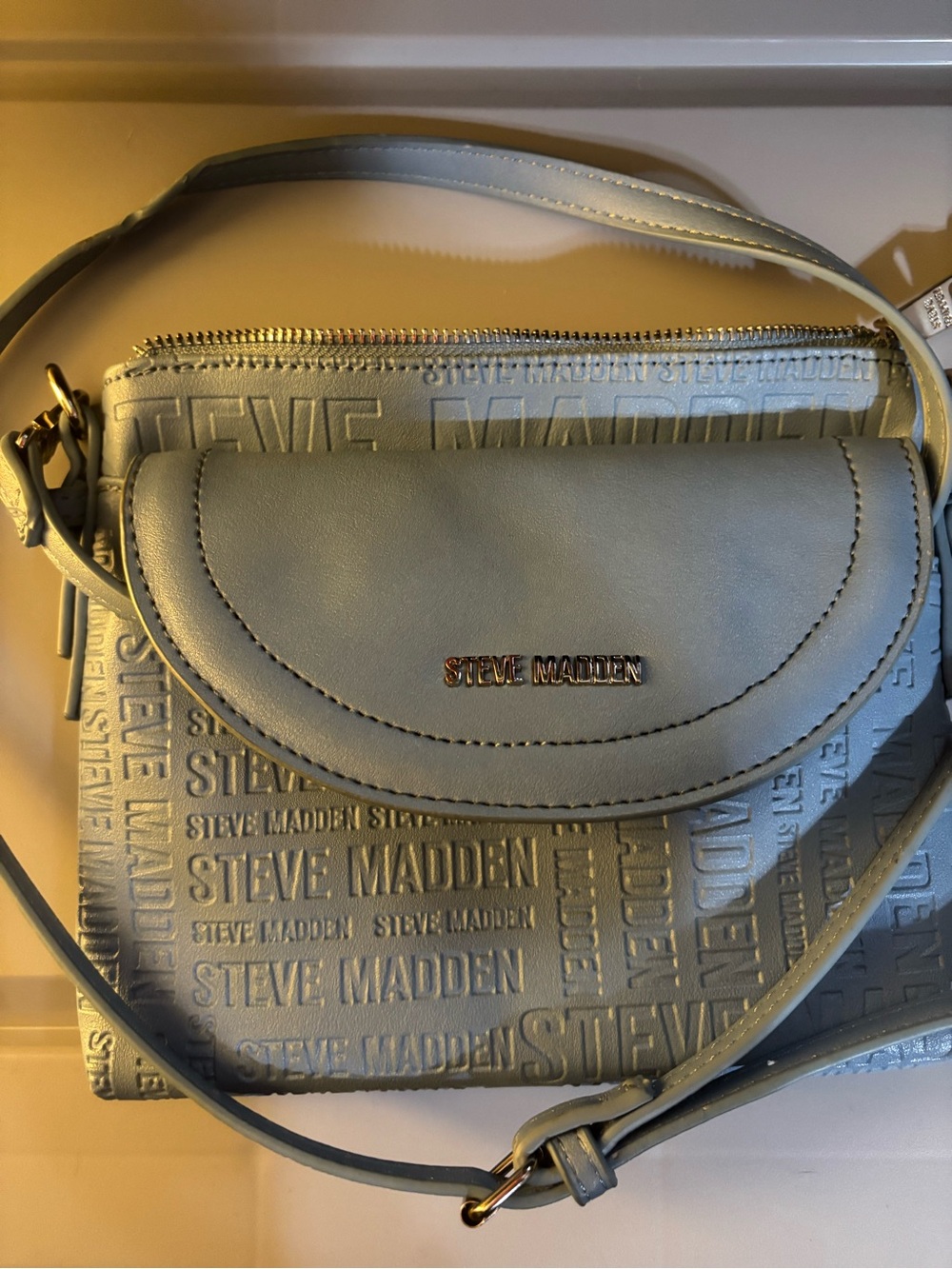 Steve Madden Pale Blue Embossed Logo Crossbody Bag